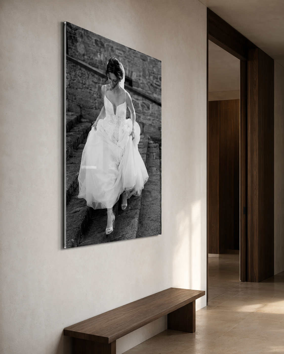 Black and white portrait acrylic glass wedding artwork in a hallway